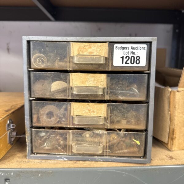 Vintage metal organiser tray with four drawers and contents.
