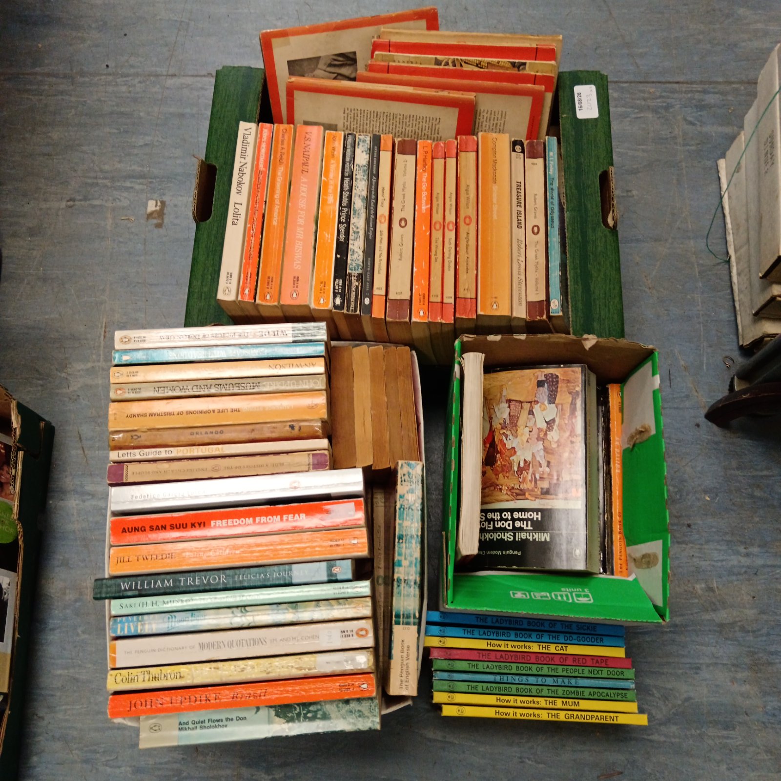Vintage Penguin and Ladybird book collection, colourful covers.