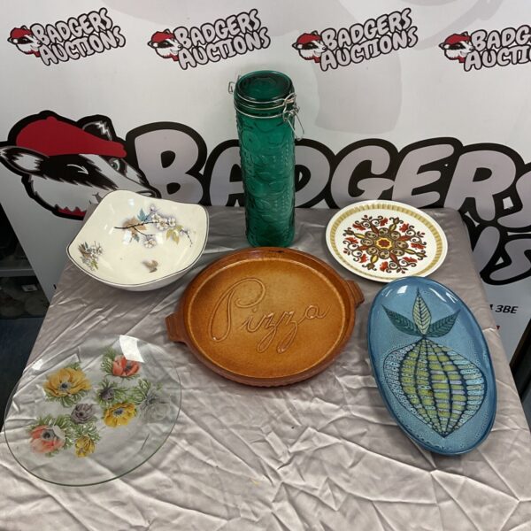 Vintage practice plates and green glass pasta jar for collectors.
