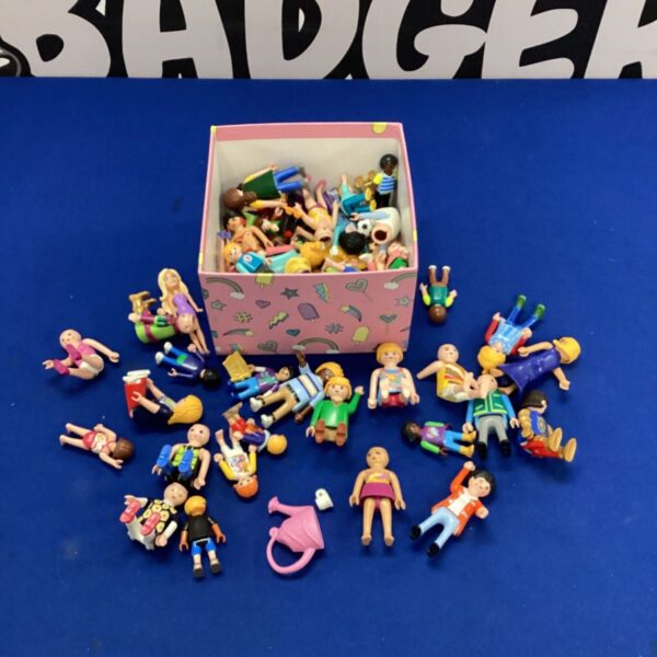 Box of vintage Playmobil figurines, a collectible toy lot.