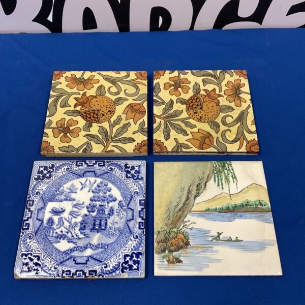 Vintage Delft porcelain tile with a classic landscape scene.