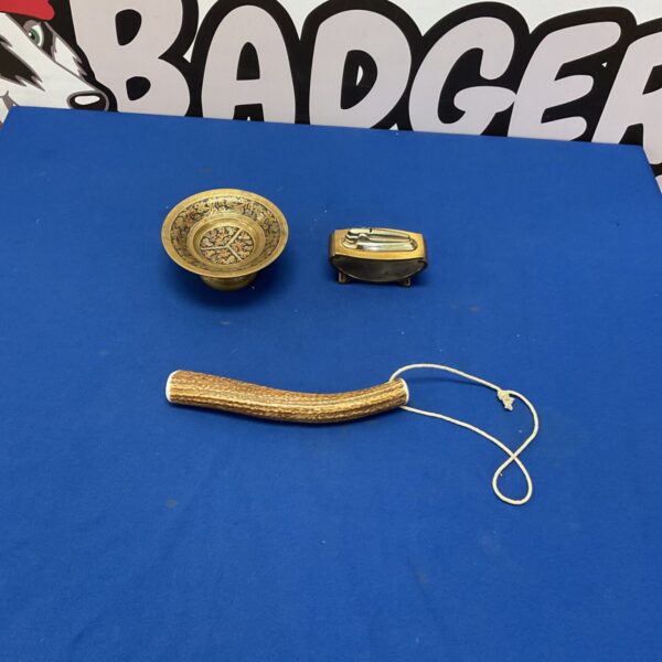 Vintage Ronson table lighter and ash tray with a sculpted horn priest.