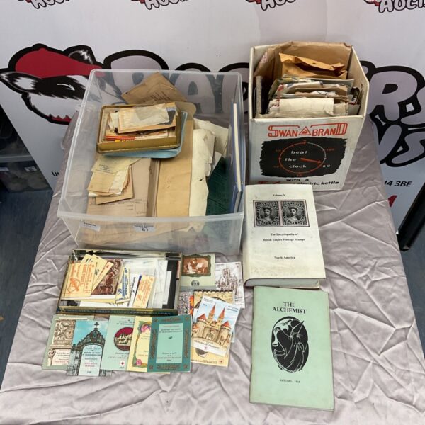 Vintage stamp collection with books for philately enthusiasts.