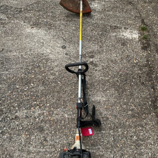 Vintage STIHL 041 petrol brushcutter in used condition.