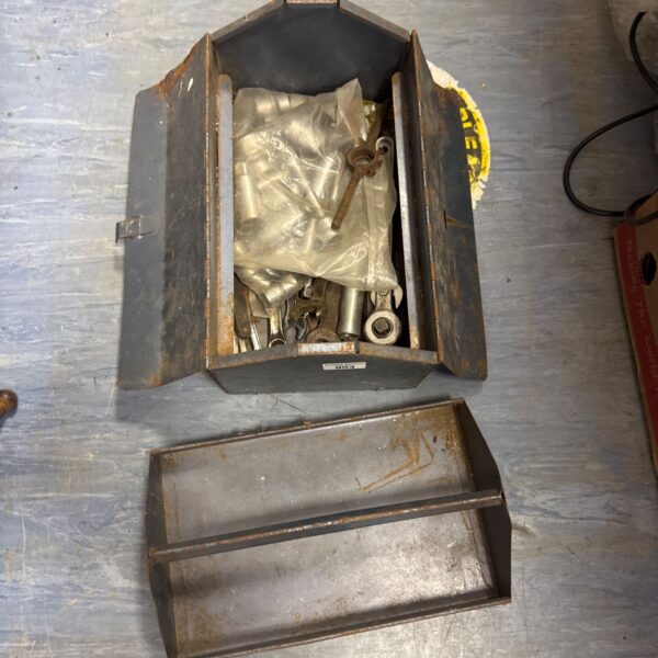 Vintage Talco metal toolbox filled with various tools.