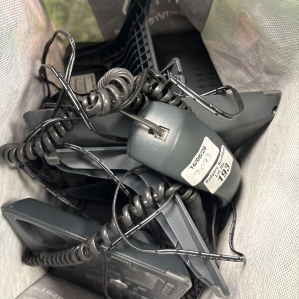 Vintage telephone lot including a snom desk phone.
