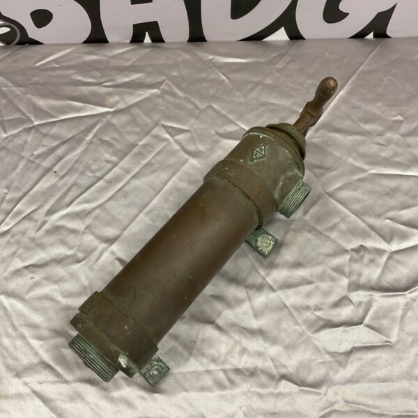 Vintage copper Thames fuel pressure primer for classic cars.