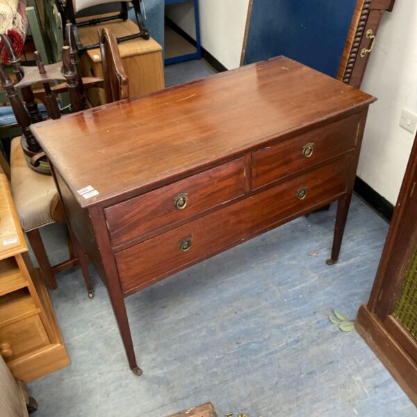 Vintage two drawer cabinet with wooden construction and classic pulls.