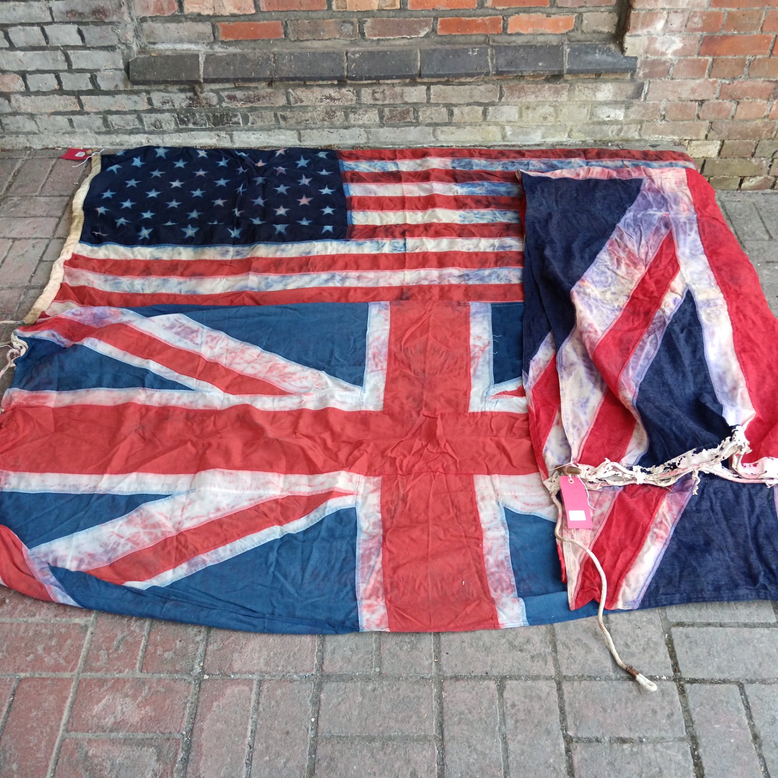 Vintage lot of Union Jack and Stars and Stripes flags.