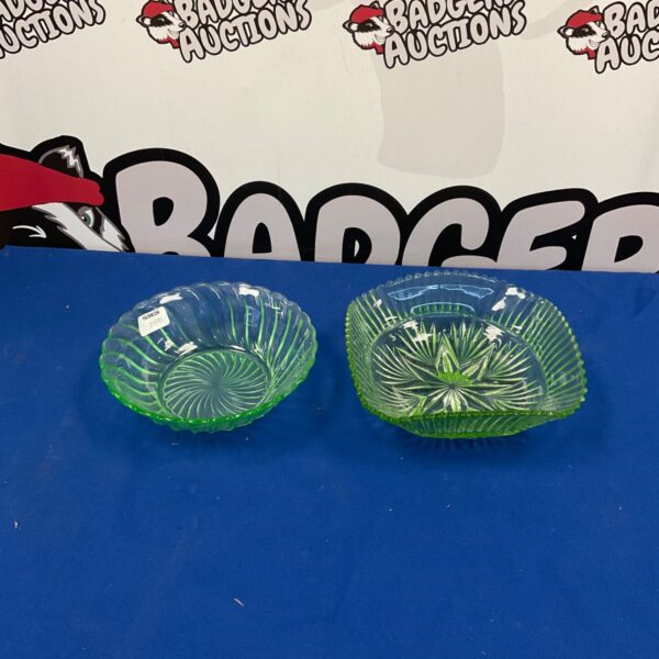 Vintage uranium glass bowls with green scalloped edges.