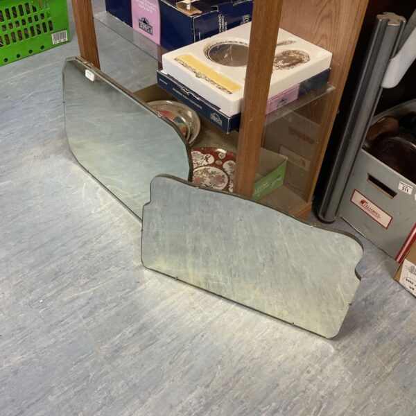 Pair of vintage wall mirrors with beveled edges.
