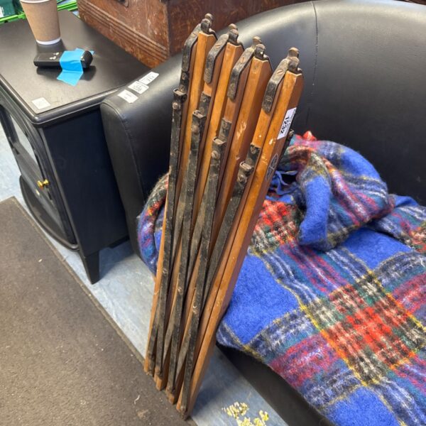 Vintage wooden trestle legs for a folding table, rustic farmhouse style.