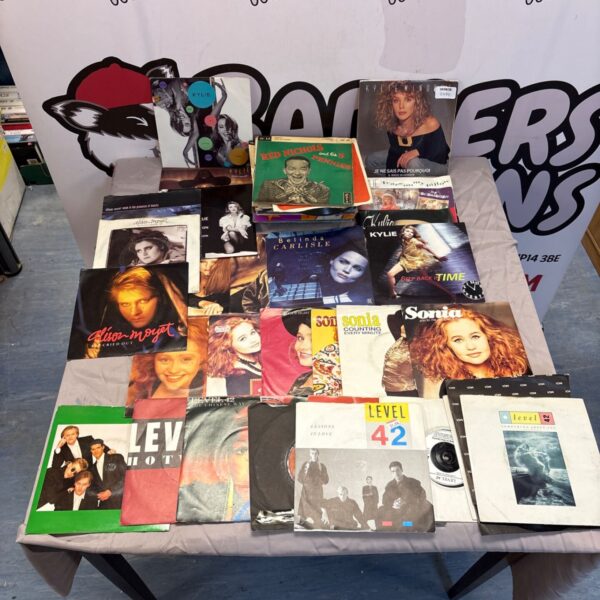 Vinyl record collection featuring Kylie Minogue, Sonia, and Belinda Carlisle.