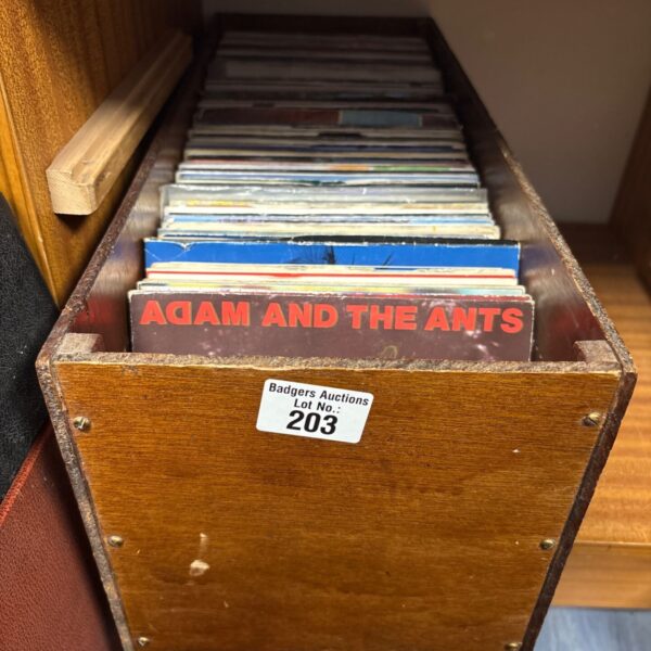 Vintage vinyl record collection with Adam and the Ants record visible.