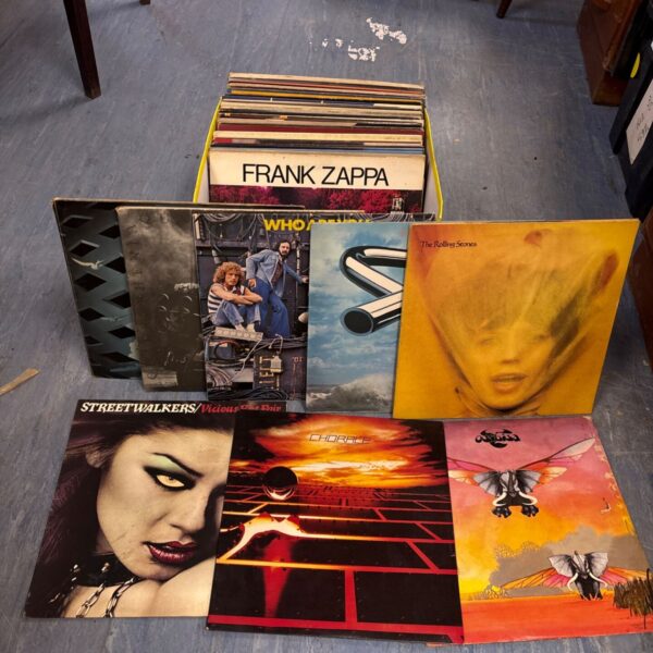 Mixed lot of vintage vinyl records including Rolling Stones and Tubular Bells.