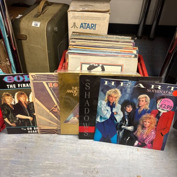 Mixed lot of 12 inch vinyl records including The Shadows and Rod Stewart.