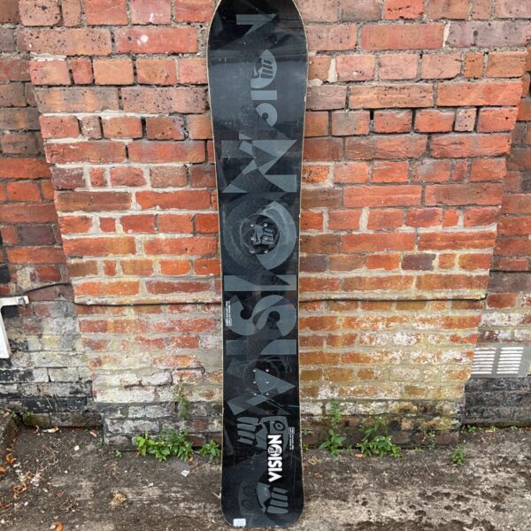 Vintage Vision snowboard with a colourful 90s graphic.