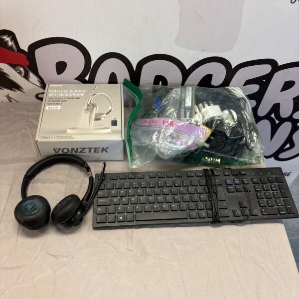 Black Vontek wireless headphones with charging dock in original packaging.