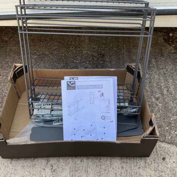 Vintage Vs Sub Rack, metal storage rack with signs of wear.