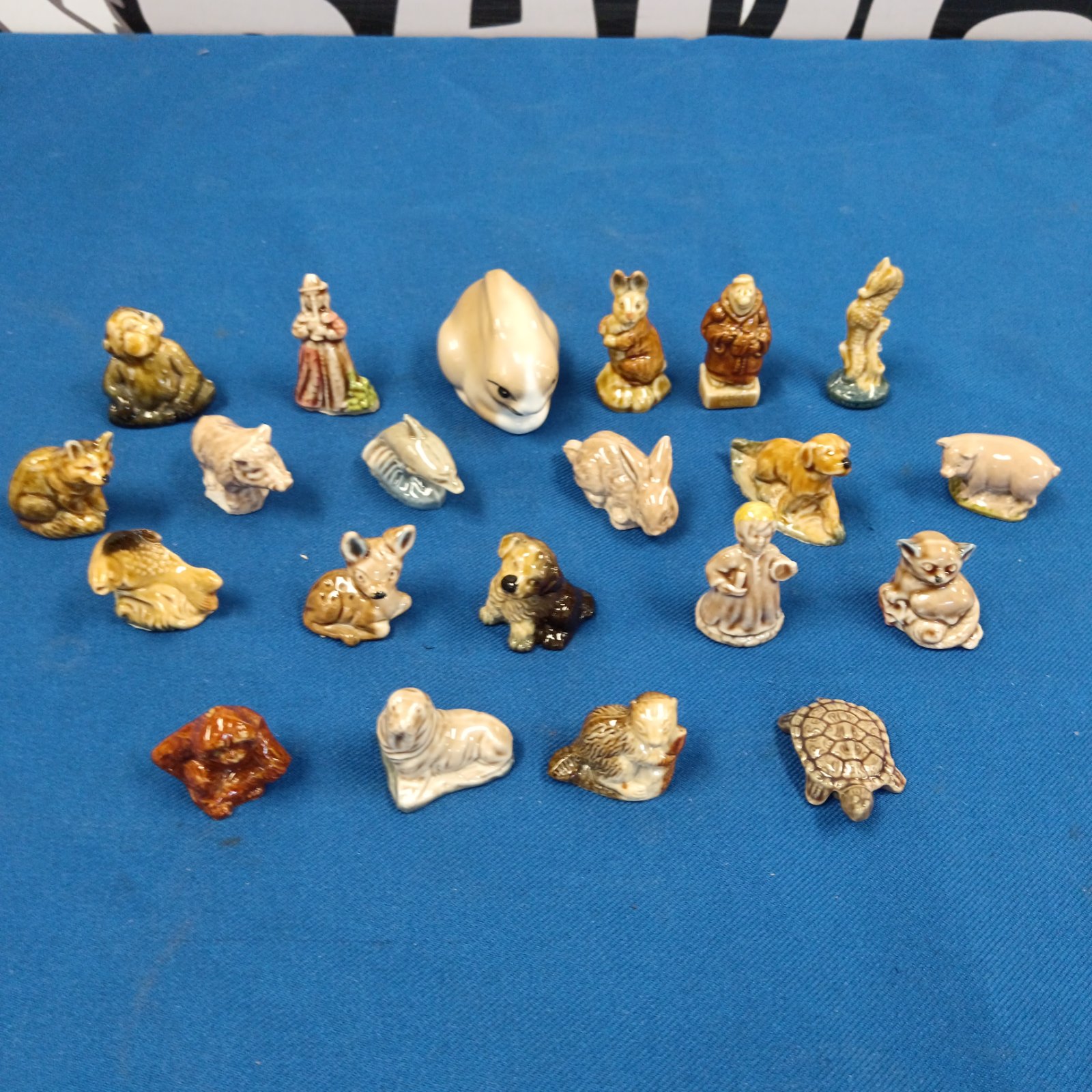 Collection of twenty vintage Wade whimsy animal figurines.
