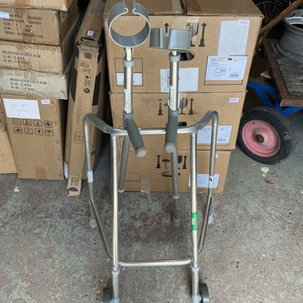 Adjustable walking frame and crutches set for mobility assistance.