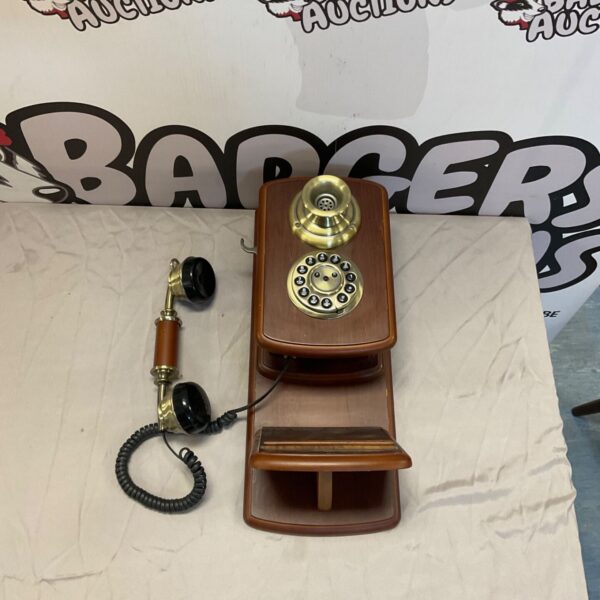 Vintage style wall mounted telephone, a decorative retro phone.