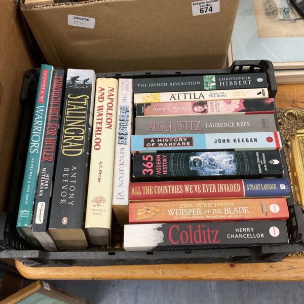 Lot of war history books including Stalingrad and Auschwitz.
