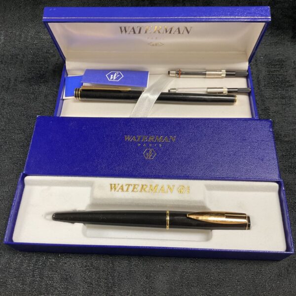 Waterman fountain pens in their original blue boxes.