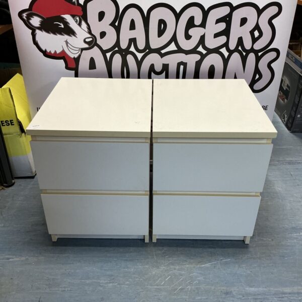 White bedside drawers, a pair of vintage bedroom storage units.