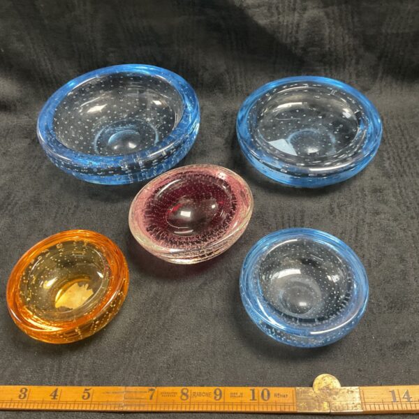 Set of five vintage Whitefriars bubble glass pin dishes in vibrant colours.
