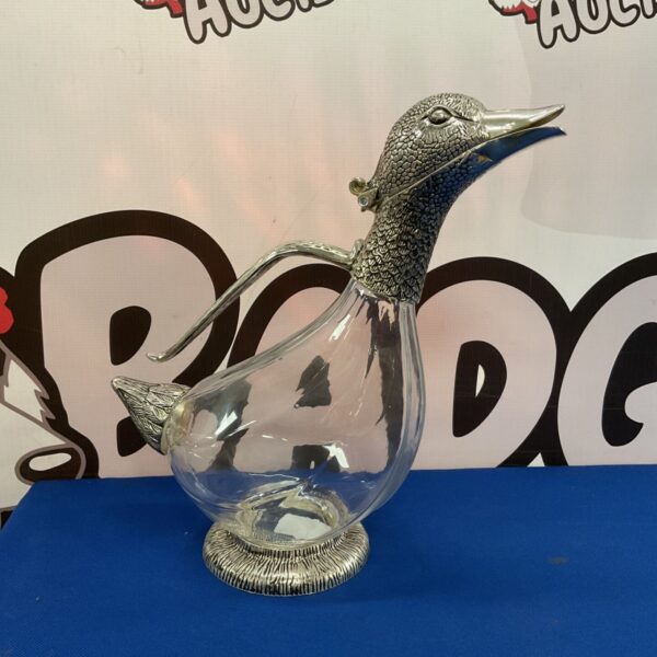 Vintage Whitehill duck decanter, a unique glass and metal barware piece.