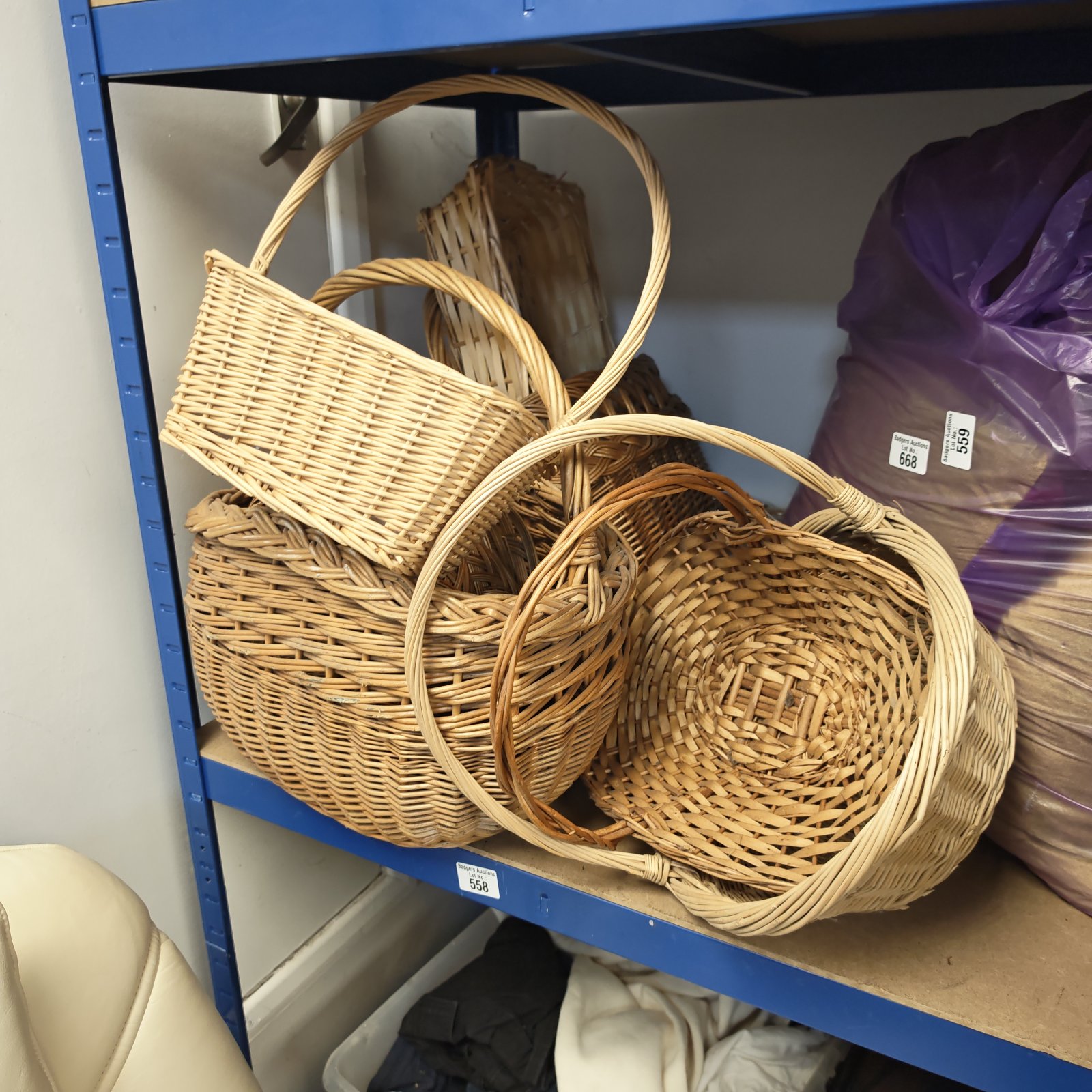 Bundle of three vintage wicker baskets for storage and display.
