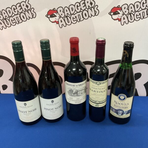 Sealed wine bottles including Felton Road Pinot Noir and Chateau Martinat.
