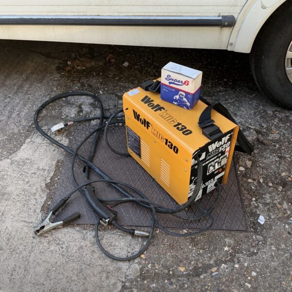 Wolf MIG 130 welder with leads and flux core.