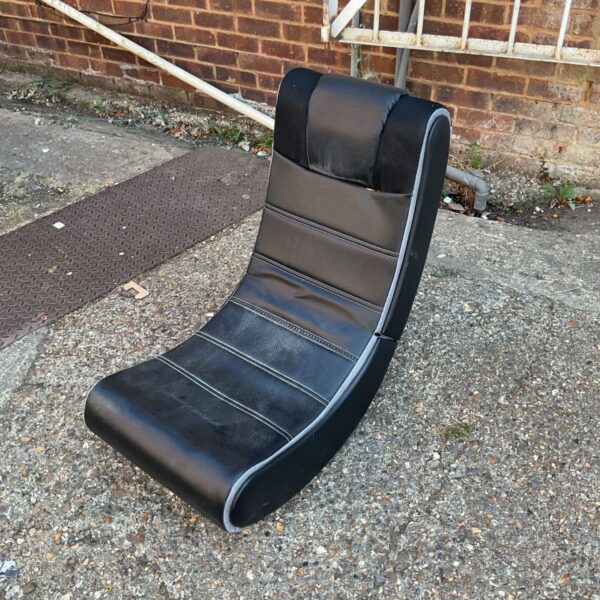 Black X Rocker gaming chair with grey piping detail.