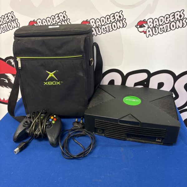 Original Xbox S controller with black bag for storage.