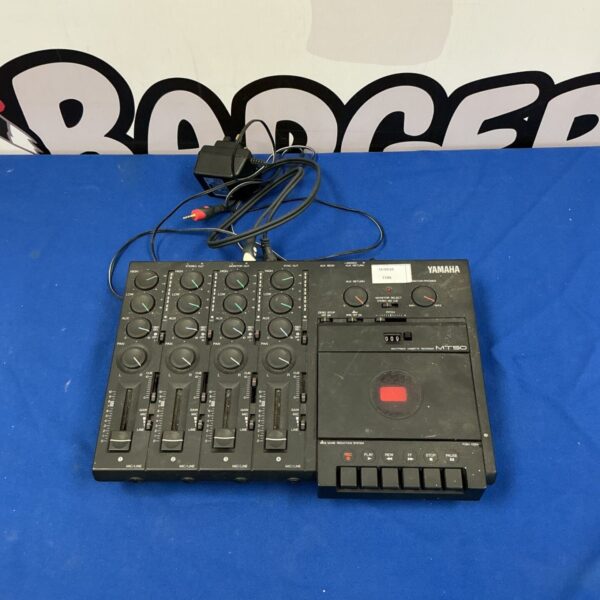 Vintage Yamaha MT50 cassette recorder with controls visible.