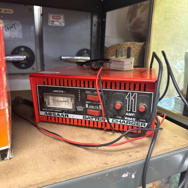 Vintage Absaar car battery charger with dial settings.