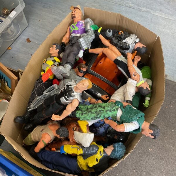 Large lot of vintage action figures and a toy stock car.