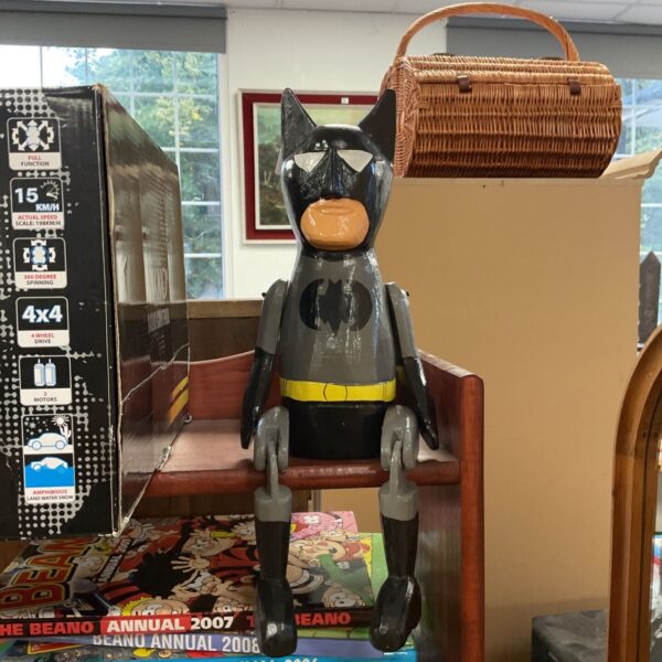 Vintage Adam West Batman wooden puppet, collectible toy.