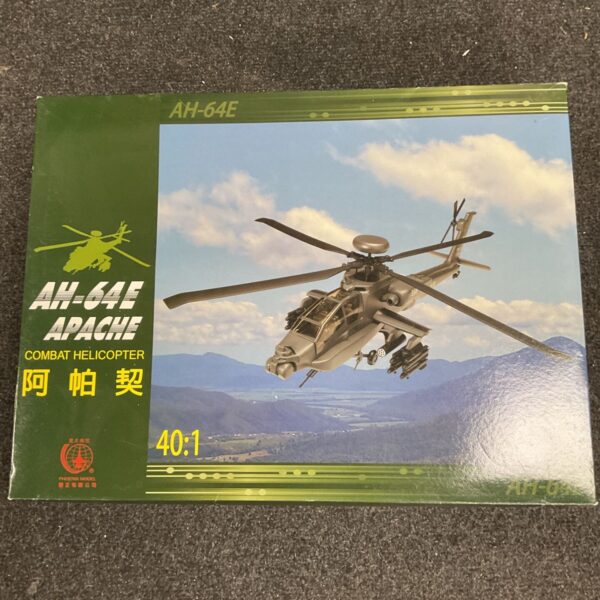 Phoenix Model AH-64E Apache helicopter in original packaging.