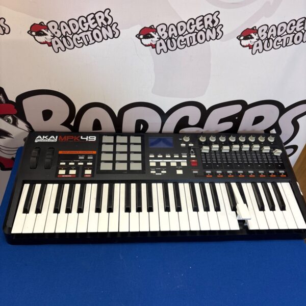 Akai MPK49 keyboard with keys, knobs, and pads for music production.
