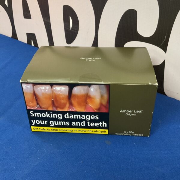 Sealed packs of Amber Leaf rolling tobacco for collectors.