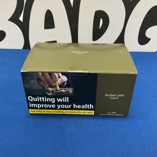 Five unopened pouches of Amber Leaf rolling tobacco.