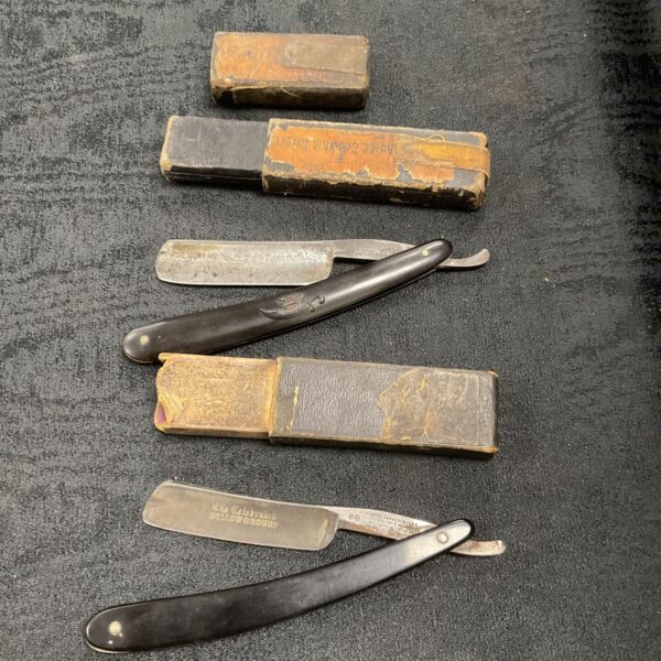 Antique cut throat razors by Joseph Rogers and German Crown and Sword.