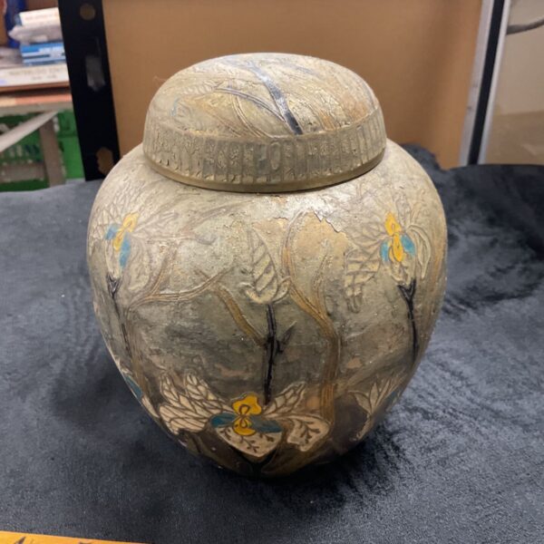 Antique enamel ginger jar with vibrant Iris motifs, 19cm high.