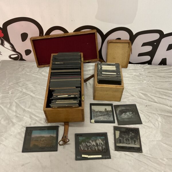 Antique magic lantern slides in a wooden case, a Victorian collectible.