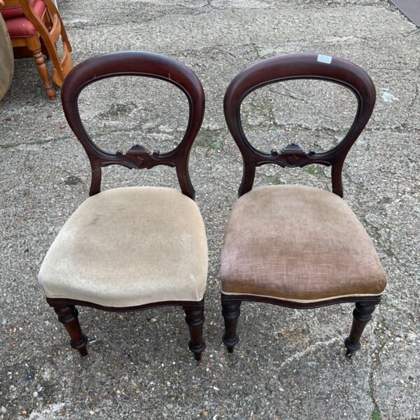 Pair of antique mahogany balloon back dining chairs.