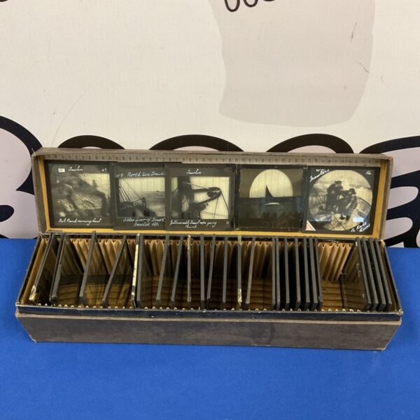 Antique magic lantern slides depicting nautical scenes for collectors.