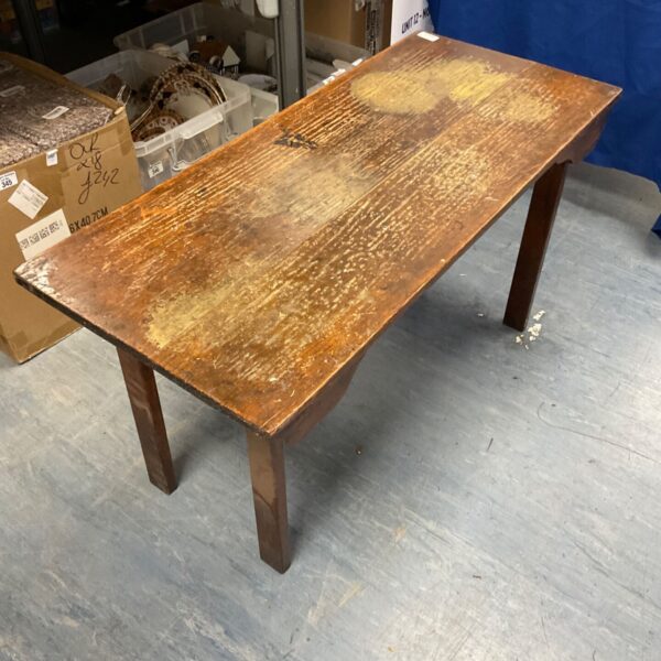 Antique oak folding coffee table with visible wear and patina.